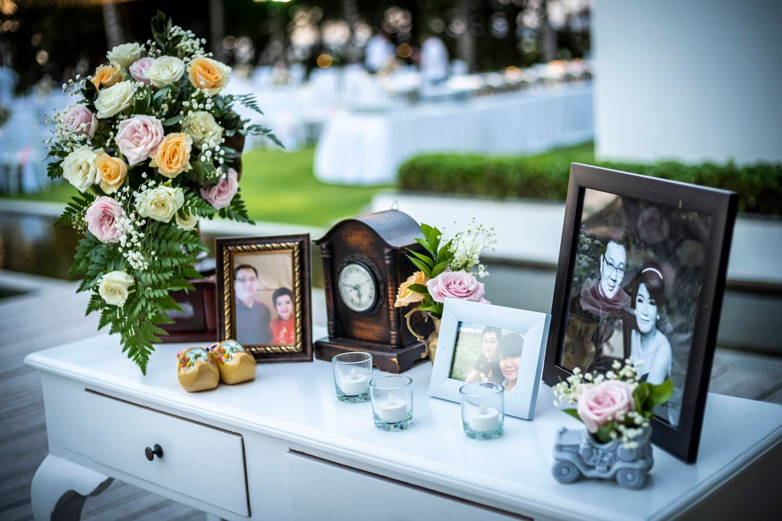Personal photo and floral welcome table at Adryan and Meliana's wedding
