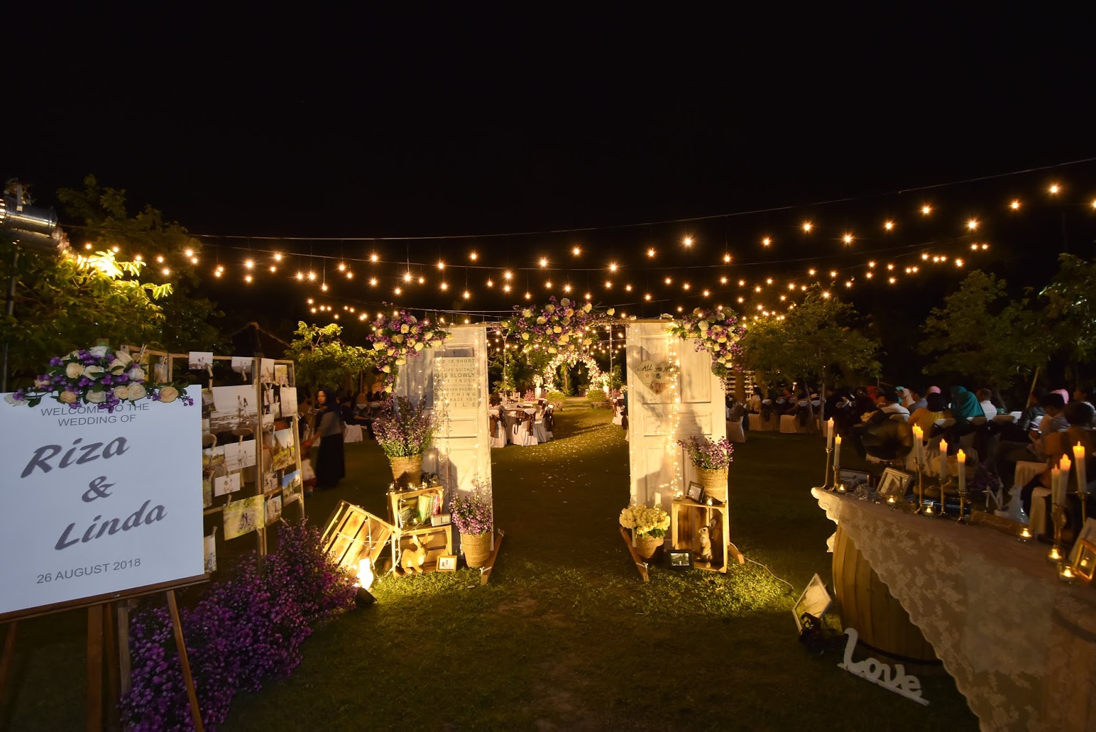 Floral entrance doors at Riza and Linda's Bokashi Farm wedding